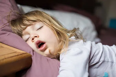 child sleeping with mouth open